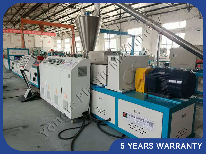 Key components of a plastic profile extrusion machine include